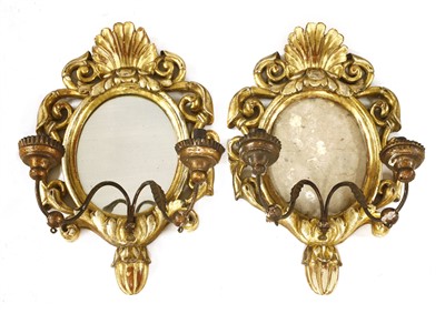 Lot 656 - A pair of possibly Irish two-light girandoles