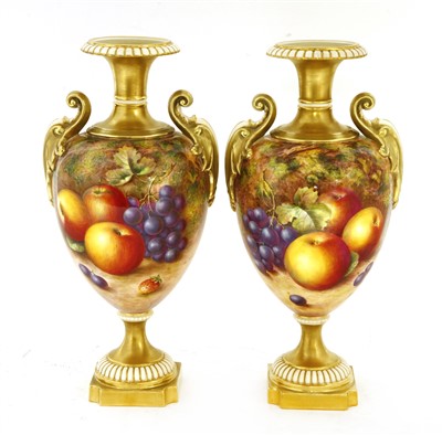 Lot 285 - A pair of Royal Worcester urn-shaped vases