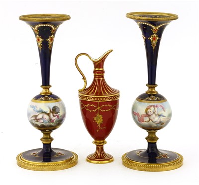 Lot 273 - A pair of Sèvres-style vases