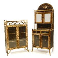 Lot 446 - A bamboo framed cabinet