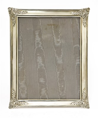 Lot 59 - A silver photograph frame and easel stand