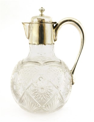 Lot 78 - A silver-mounted cut glass claret jug