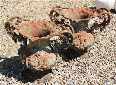 Lot 471 - A pair of cast iron planters