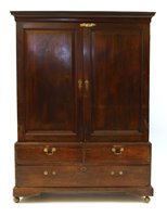 Lot 725 - An 18th century mahogany gentlemans press cupboard with brass carrying handles