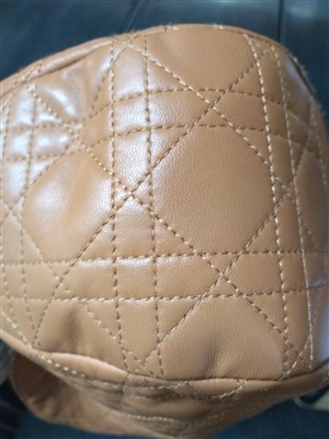 Lot 142 - A Christian Dior tan cannage quilted lambskin leather tote handbag