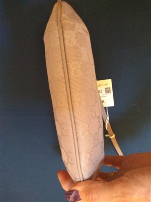 Lot 796 - A Gucci lilac monogram canvas shoulder bag
