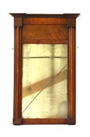 Lot 682 - A Regency period mahogany pier mirror with original plate