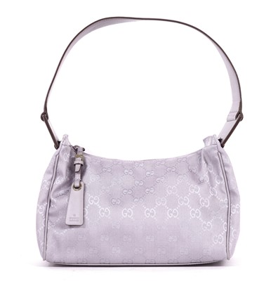 Lot 795 - A Gucci purple monogrammed canvas shoulder handbag
