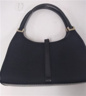 Lot 791 - A Gucci Jackie black leather and canvas handbag