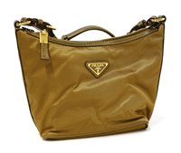 Lot 185 - A Prada metallic canvas mini shopper handbag