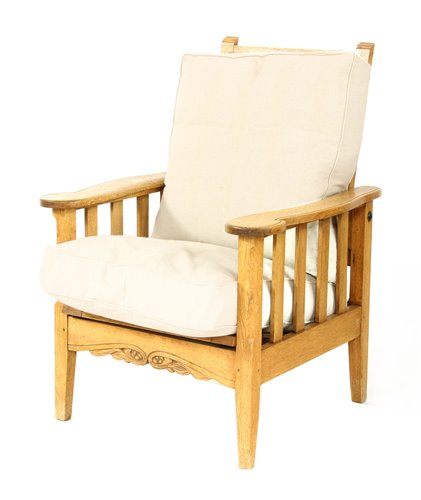 Lot 63 - An oak reclining armchair