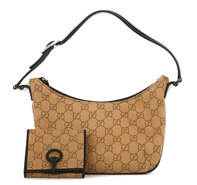 Lot 207 - A Gucci tan monogram canvas shoulder bag