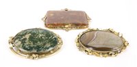 Lot 282 - A large Victorian oval polished moss agate brooch