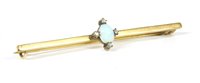 Lot 212 - An opal and diamond bar brooch