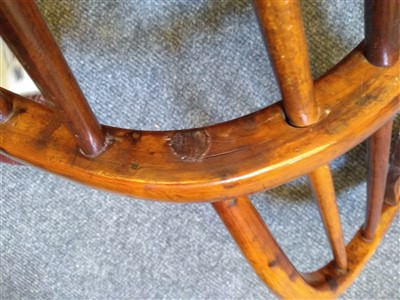 Lot 527 - A yew wood and elm child's Windsor chair
