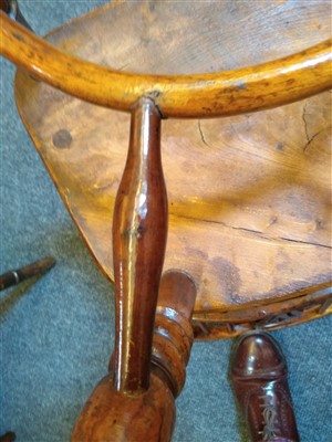 Lot 527 - A yew wood and elm child's Windsor chair