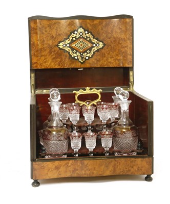 Lot 589 - A Continental burr wood and inlaid decanter box
