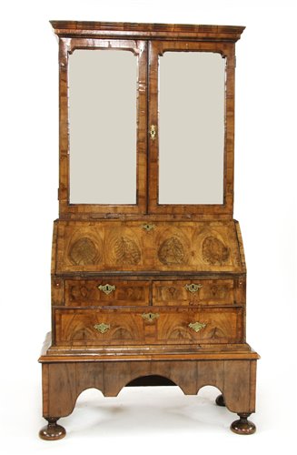 Lot 505 - A walnut, feather-banded and fruitwood bureau cabinet on stand