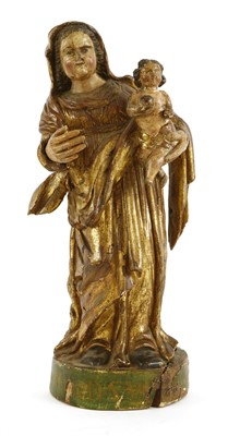 Lot 723 - A carved wooden, gesso and polychrome painted figure of the Madonna and child