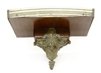 Lot 606 - A Continental mahogany and gilt metal mounted wall bracket