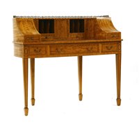 Lot 705 - An Edwardian satinwood Carlton house desk