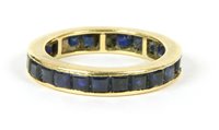 Lot 216 - A sapphire flat section eternity ring
