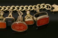 Lot 13 - An 18ct gold curb link bracelet with later 9ct gold padlock and eleven assorted seals