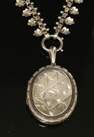 Lot 117 - A Victorian silver hinged oval locket