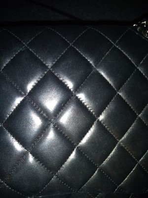 Lot 742 - A Chanel classic single flap black leather maxi handbag