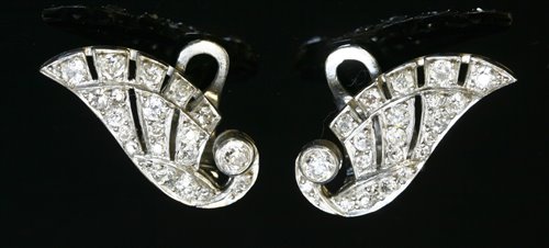 Lot 193 - A pair of Art Deco diamond set wing earrings