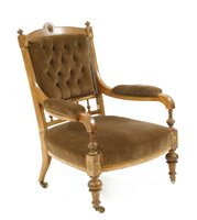 Lot 837 - An Edwardian satinwood library chair