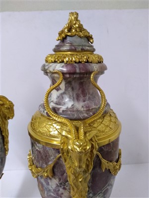 Lot 554 - A pair of rouge marble and ormolu-mounted urns