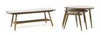 Lot 751 - A set of post war Ercol elm and beech pebble tables