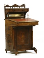 Lot 699 - An Edwardian rosewood and inlaid Davenport