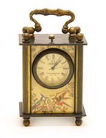 Lot 387 - A miniature carriage clock