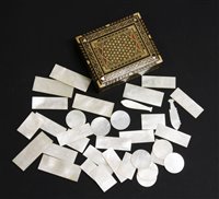 Lot 110 - A quantity of mother-of-pearl gaming counters