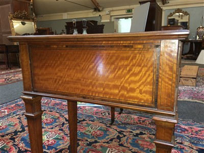 Lot 305 - An Howard & Sons satinwood writing table