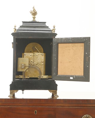 Lot 101 - An Edwardian ebonised mantel clock
