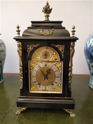 Lot 101 - An Edwardian ebonised mantel clock