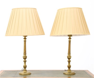 Lot 124 - A pair of brass 'candlestick' table lamps