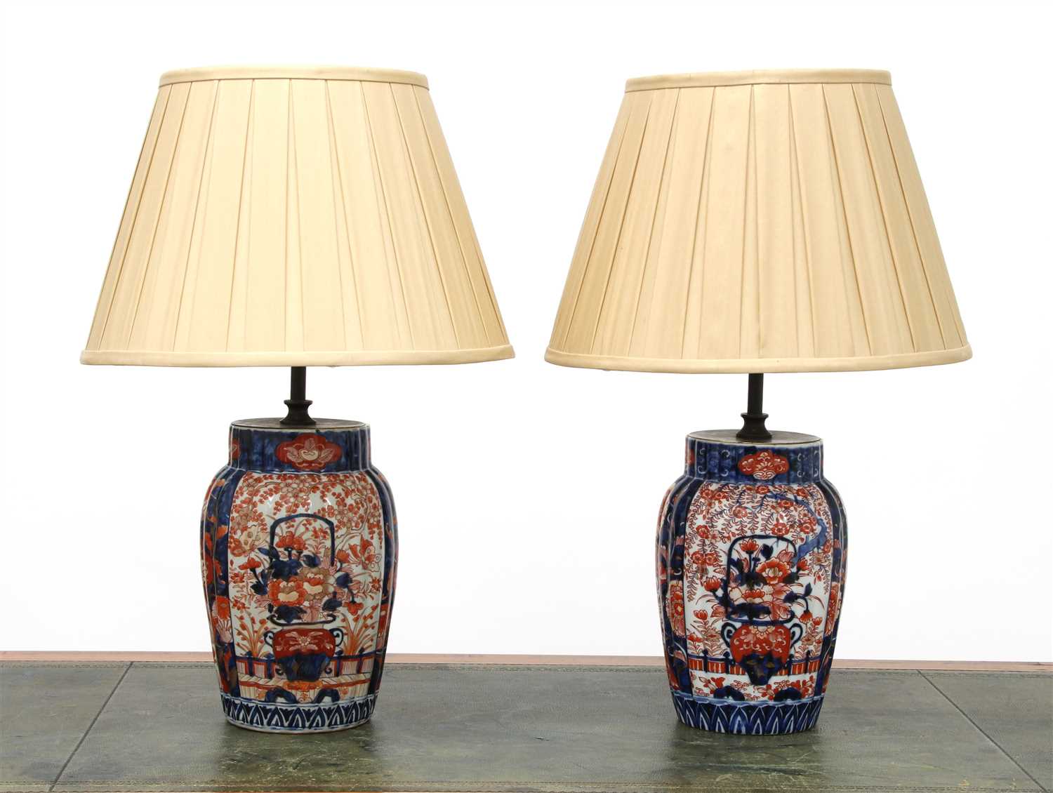 Lot 275 - A near pair of Imari vase table lamps