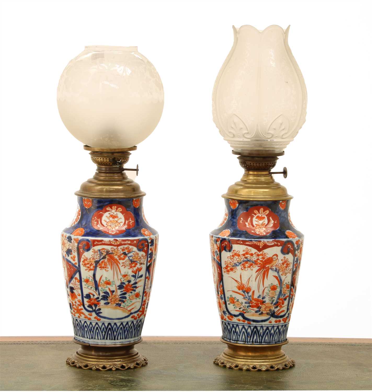 Lot 356 - A pair of Imari vase oil lamps