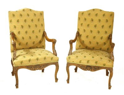 Lot 738 - A pair of French beech armchairs