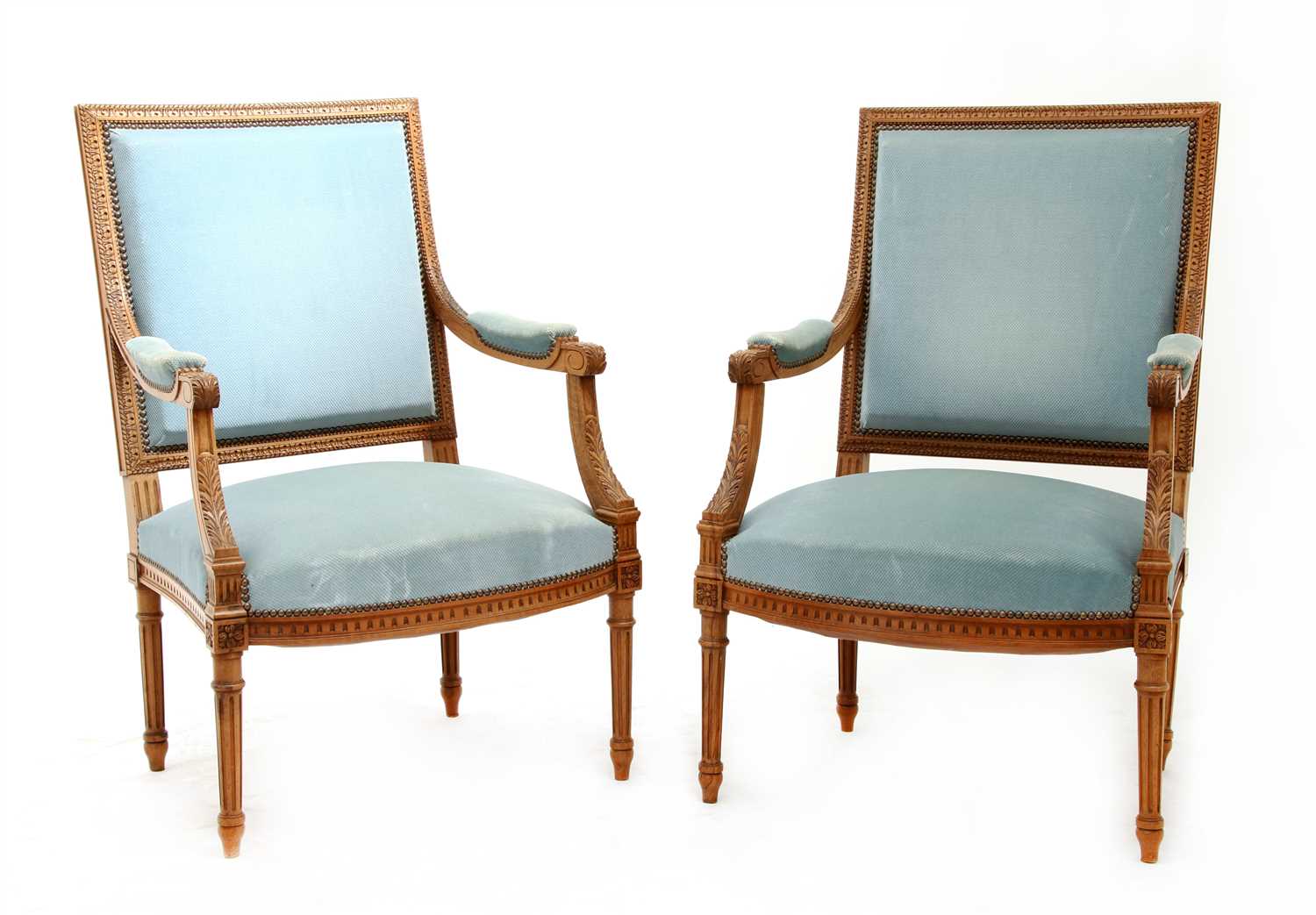 Lot 235 - A pair of French walnut fauteuils