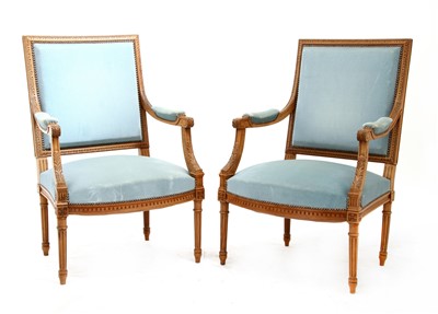 Lot 235 - A pair of French walnut fauteuils