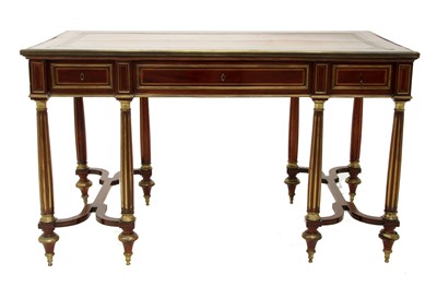 Lot 289 - A Louis XVI-style mahogany bureau plat