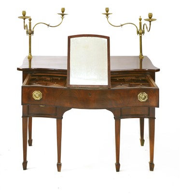 Lot 667 - A George III mahogany serpentine dressing table