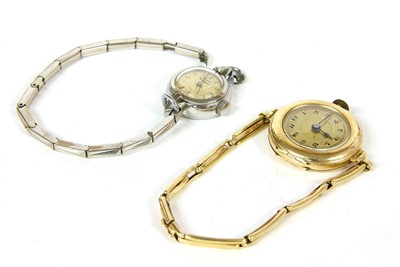 Lot 6 - A ladies stainless steel Giraud Peregaux mechanical cordette strap watch