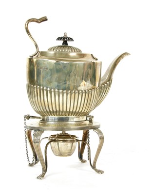 Lot 105 - An early 20th century silver tea kettle on stand