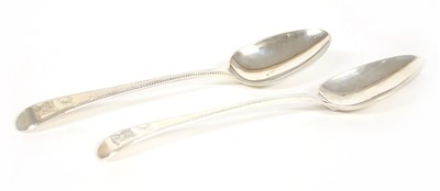 Lot 50 - A pair of old English pattern silver serving spoons